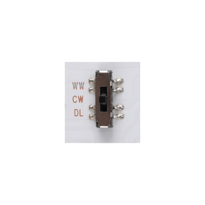 DIP switch, metal and plastic, brown and silver, surface mount.