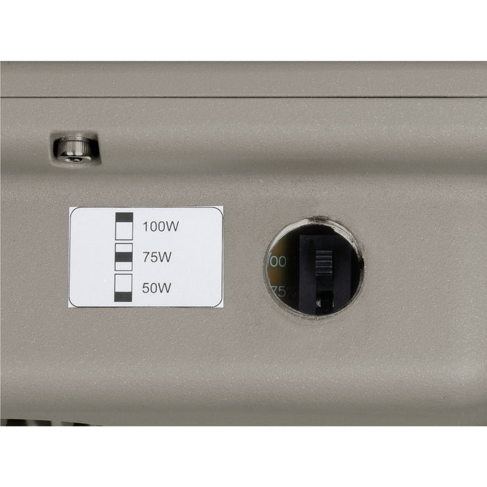 Close-up of a gray metal enclosure with a wattage selector switch and power level label.