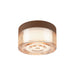 Glass flush mount ceiling light with brown cork trim.