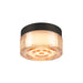 Flush mount ceiling light with amber glass shade and black metal trim.