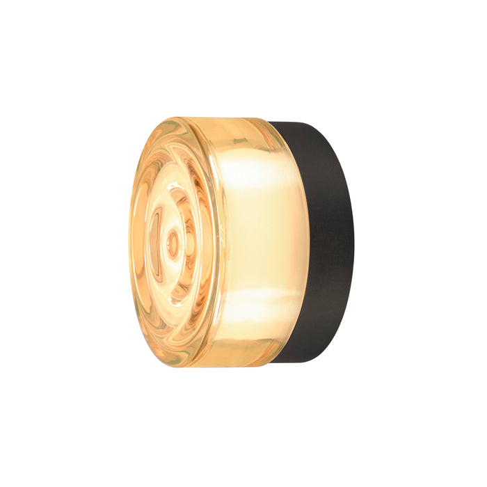 Glass wall sconce with black mounting, amber color.