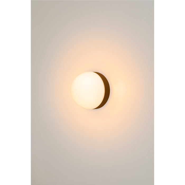 Opal glass wall sconce with a bronze-colored metal base.