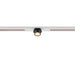 Black track lighting fixture mounted on a white track.