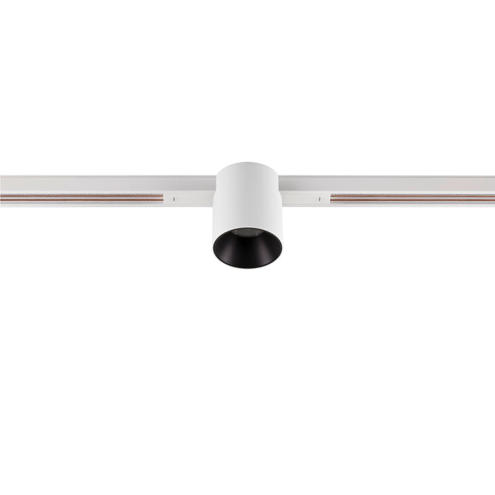 White cylinder track lighting fixture with black interior.
