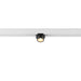 Black track lighting fixture mounted on a white track.