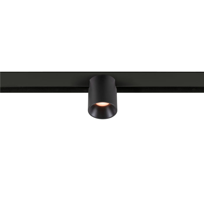 Black track lighting fixture, cylinder shape, mounted on track.