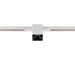 White square track lighting fixture, surface mounted.
