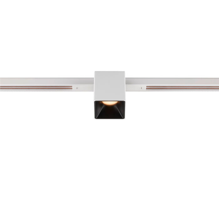 White square track lighting fixture.