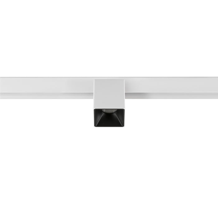 White track lighting fixture, square head, mounted on track.