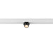 Black track lighting fixture mounted on a white track.