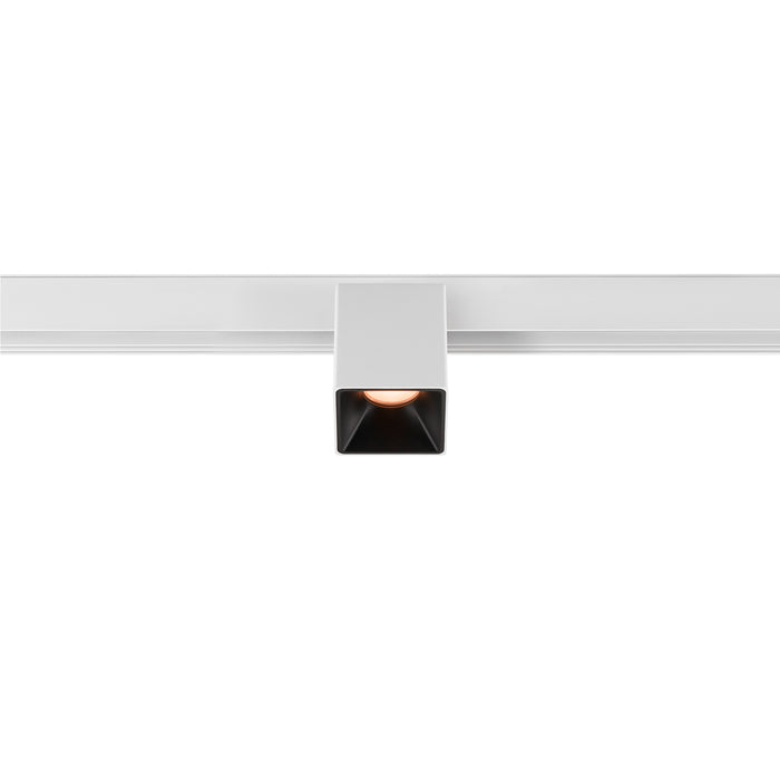 White square track lighting fixture.