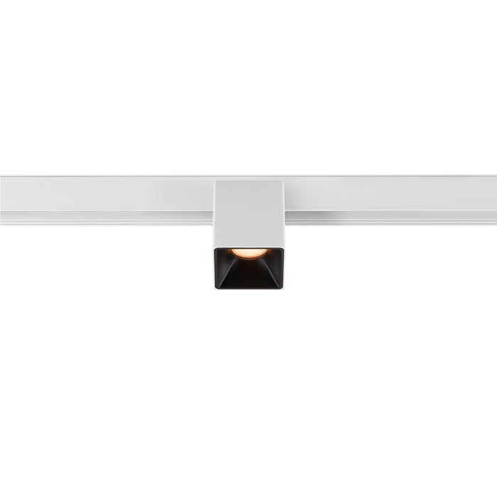 White square track lighting fixture.