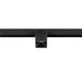 Black square track lighting fixture, mounted on a track.