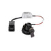 Black recessed LED light fixture with spring clips and white power supply.