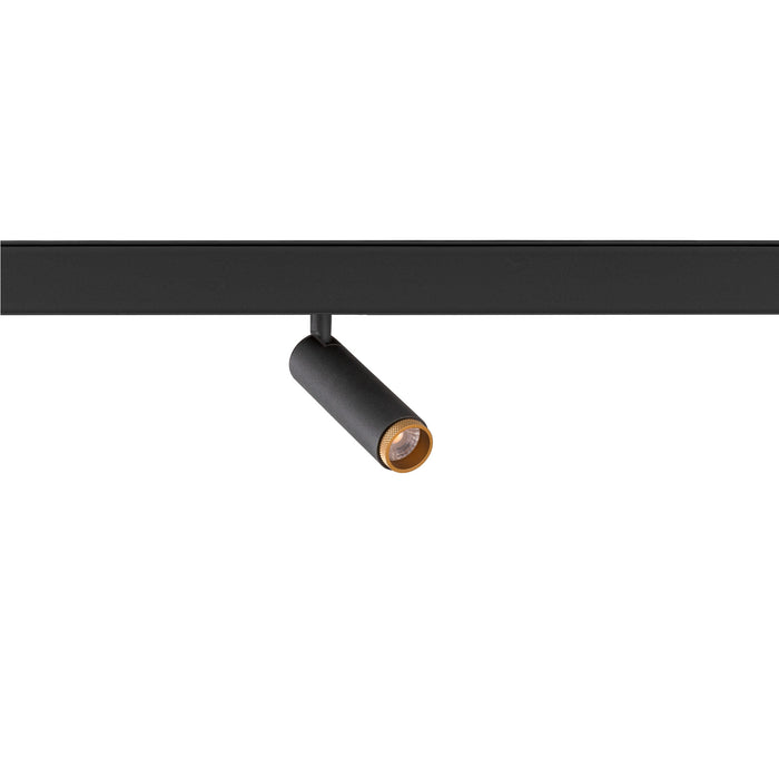 Black track lighting fixture with cylindrical head and gold accent.