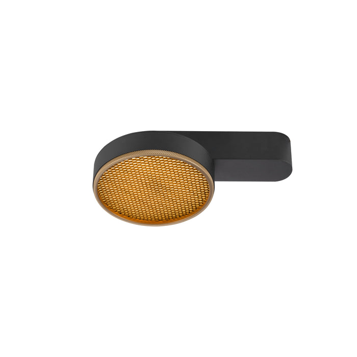 Black metal wall sconce with gold honeycomb diffuser.