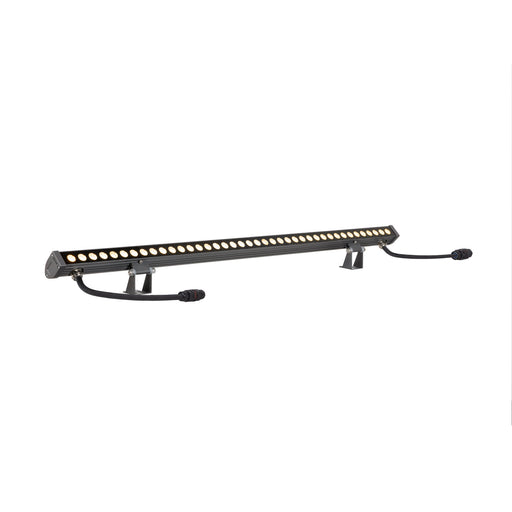 Gray aluminum LED wall wash light fixture with mounting brackets.