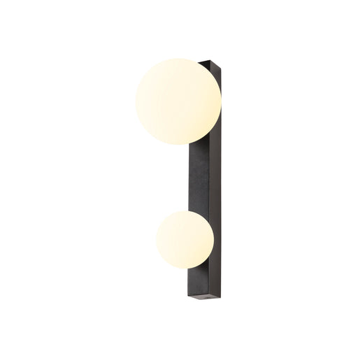 Black metal wall sconce with two round, white glass shades.