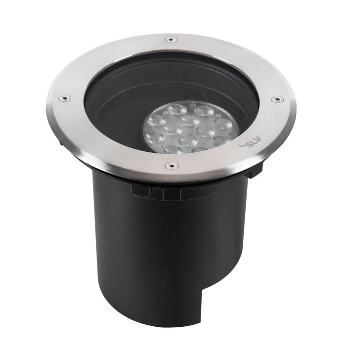 Black in-ground light fixture with a brushed stainless steel trim ring.