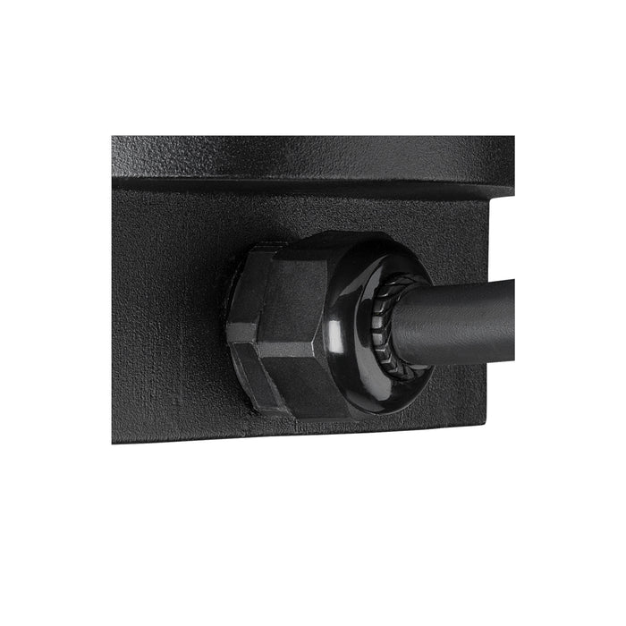 Close-up of a black metal wall mount with a textured finish and a black cable secured by a nut.
