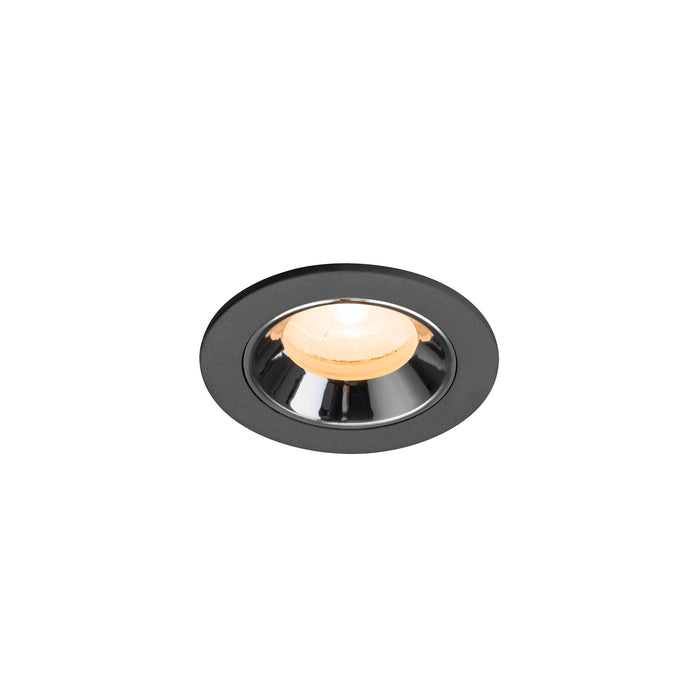 Recessed ceiling light fixture in black metal with a chrome finish and warm white LED bulb, designed for flush mounting.