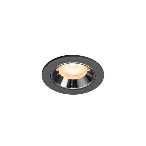 Recessed ceiling light fixture in black metal with a chrome finish and warm white LED bulb, designed for flush mounting.