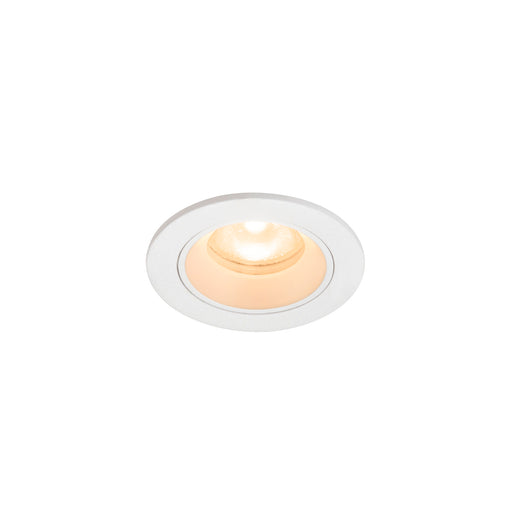 White recessed downlight fixture, flush mount.