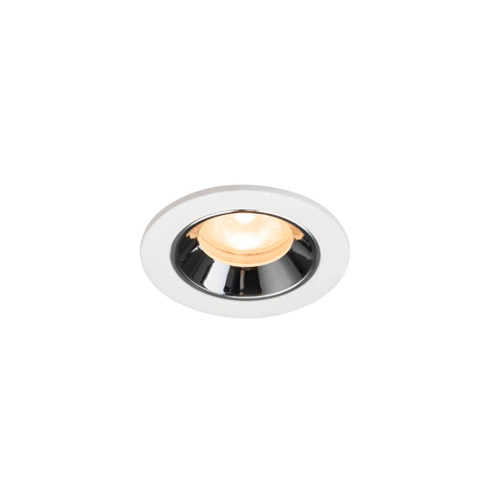 Recessed ceiling light fixture in white metal with a chrome finish and warm LED bulb, designed for flush mounting.