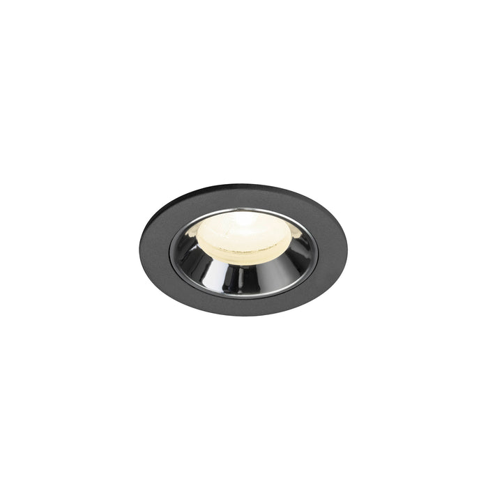Recessed ceiling light fixture in black metal with a chrome finish and warm white LED bulb, designed for flush mounting.