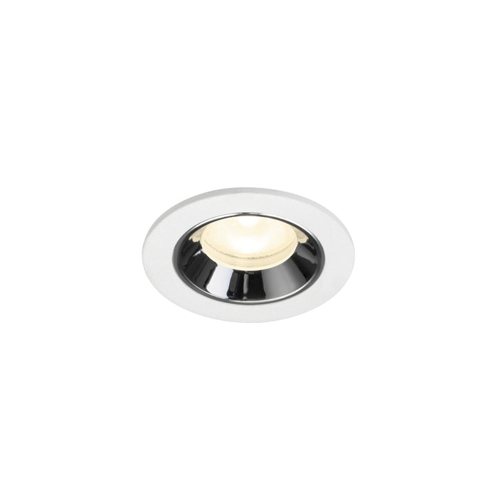 Recessed ceiling light fixture made of metal with a chrome finish and white trim, featuring a warm white LED bulb for modern illumination.