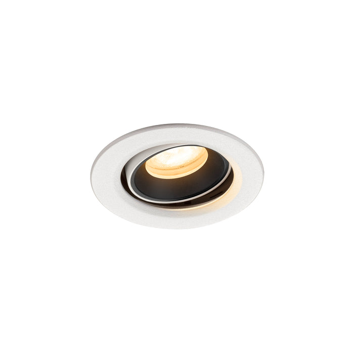 Recessed ceiling light fixture in white finish with a black interior, made of metal, designed for easy mounting and providing warm illumination.