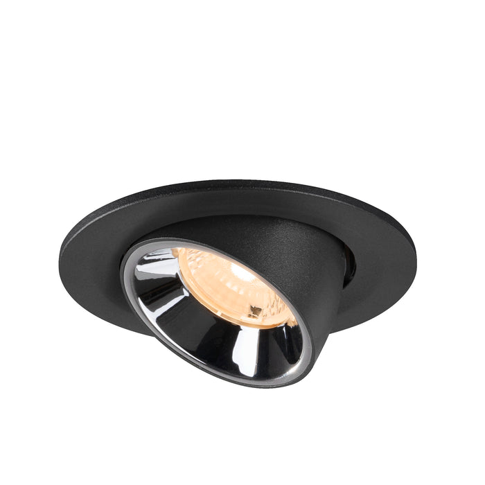 Recessed spotlight in black metal with a chrome finish, featuring a warm light bulb and designed for ceiling mounting.