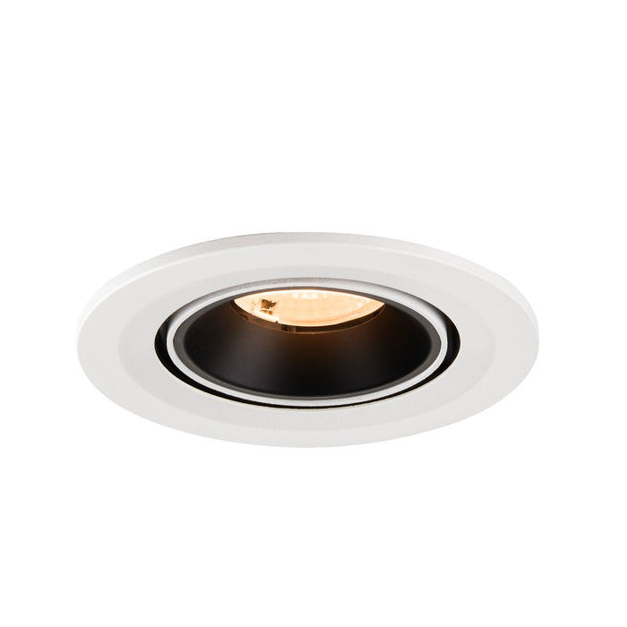 Recessed ceiling light fixture with a white metal finish and black interior, designed for easy mounting and providing focused illumination.