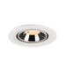 Recessed ceiling light fixture made of metal with a chrome finish and white trim, featuring a warm LED bulb for ambient lighting.