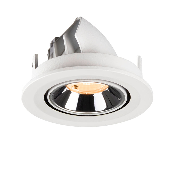 Recessed ceiling light fixture in white metal with a chrome finish, featuring an adjustable mount and a warm light bulb.