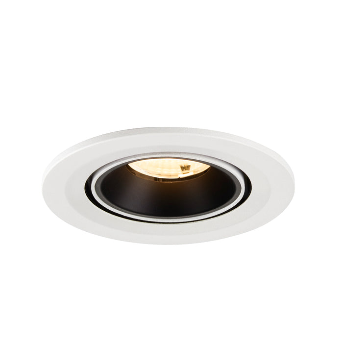 Recessed ceiling light fixture with a white metal finish and black interior, designed for easy mounting and providing warm illumination.
