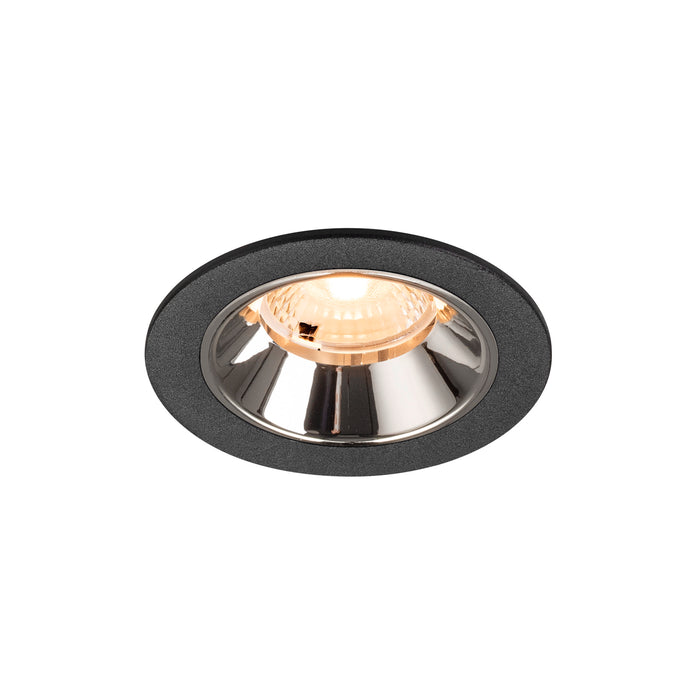 Recessed ceiling light fixture with a black finish, chrome reflector, and glass lens for modern interior lighting.