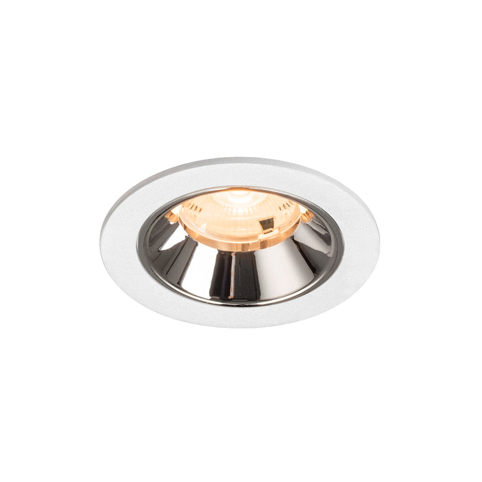 Recessed ceiling light fixture with a chrome finish, white metal trim, and warm LED bulb, designed for flush mounting.