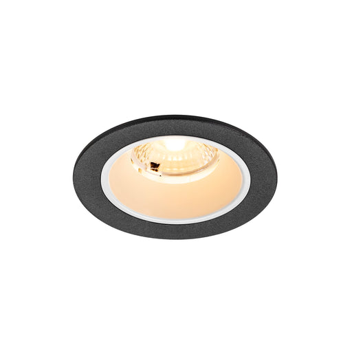 Recessed ceiling light fixture, textured black finish, with white trim.