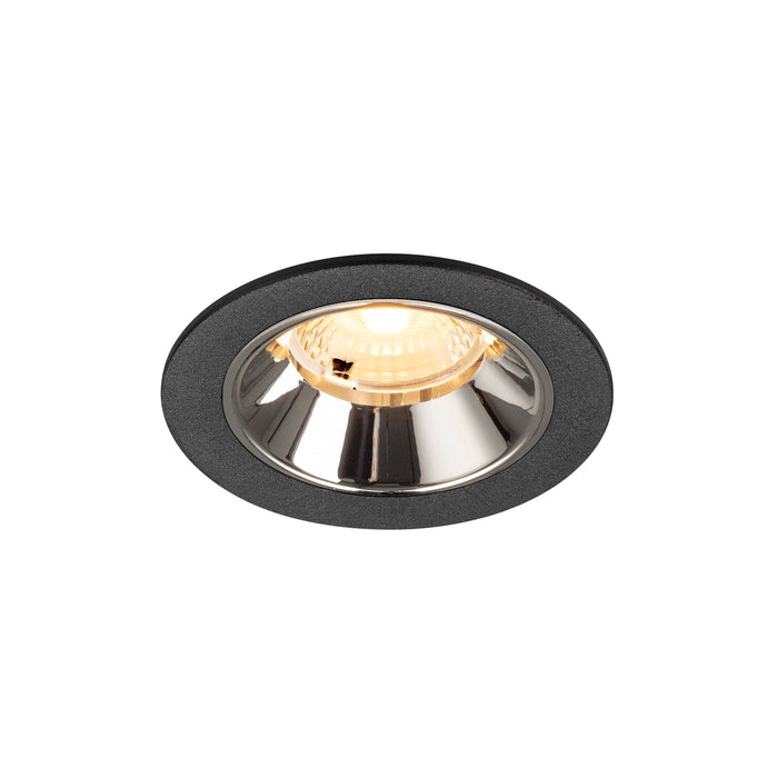 Recessed ceiling light fixture with a black finish, chrome reflector, and glass lens for modern interior lighting.
