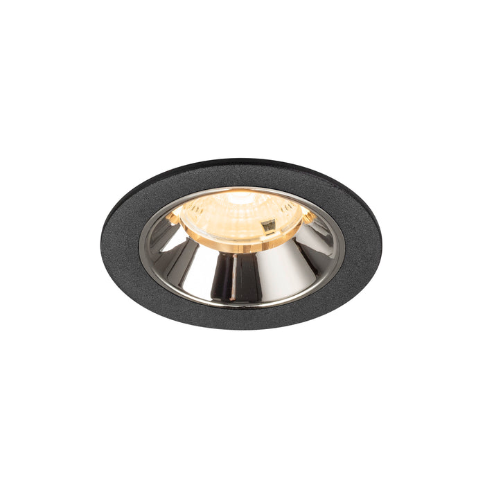 Recessed ceiling light fixture with a black finish, chrome reflector, and warm white bulb, designed for easy mounting in various settings.