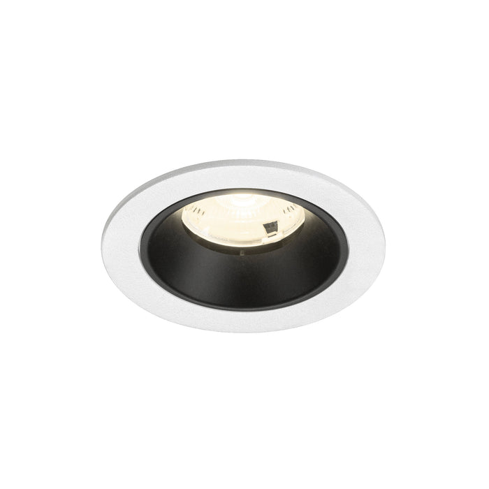 Recessed ceiling light fixture with a white metal finish and black interior, featuring a round design for easy mounting.