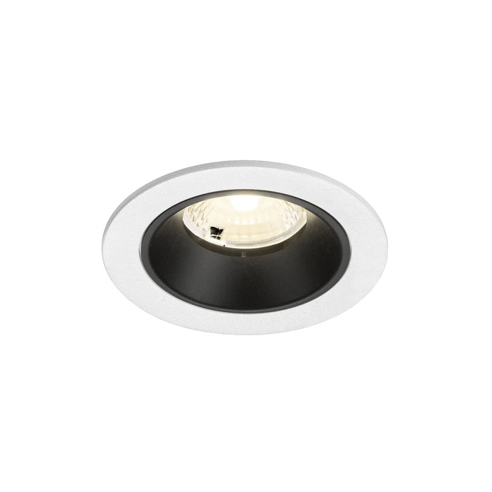 Recessed ceiling light fixture with a white metal finish, black interior, and clear glass lens for modern lighting solutions.