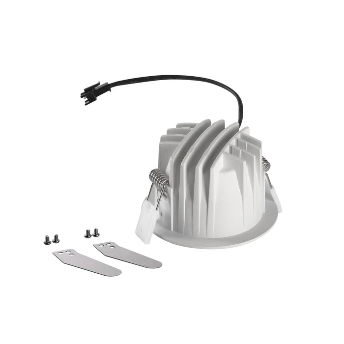 Recessed LED downlight with white finish, spring mounting clips, and mounting hardware.
