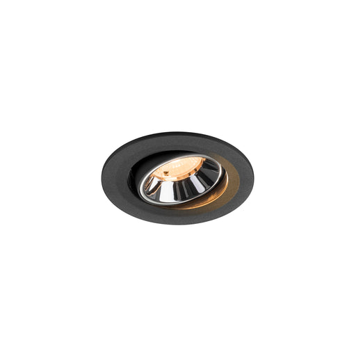 Recessed ceiling light fixture with a black matte finish, chrome reflector, and warm white LED light source.