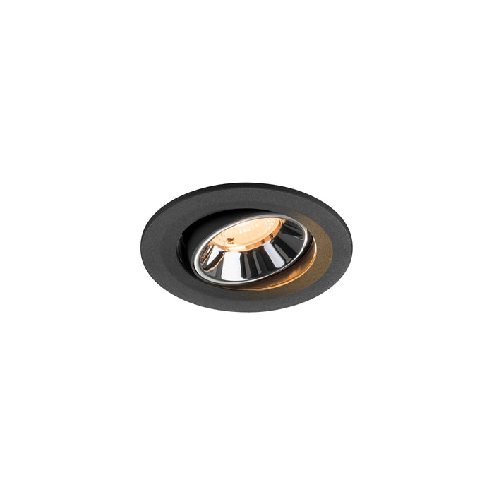 Recessed ceiling light fixture with a black matte finish, chrome reflector, and warm white LED light source.