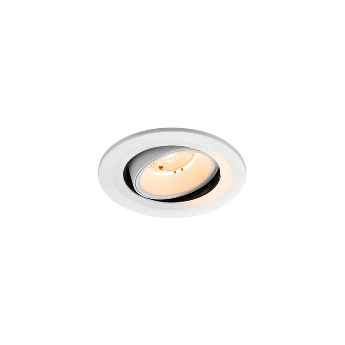 White recessed ceiling light fixture, adjustable angle, with textured finish.