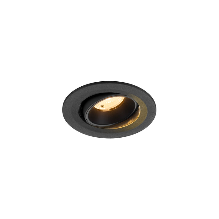 Black recessed ceiling light fixture with adjustable lamp.