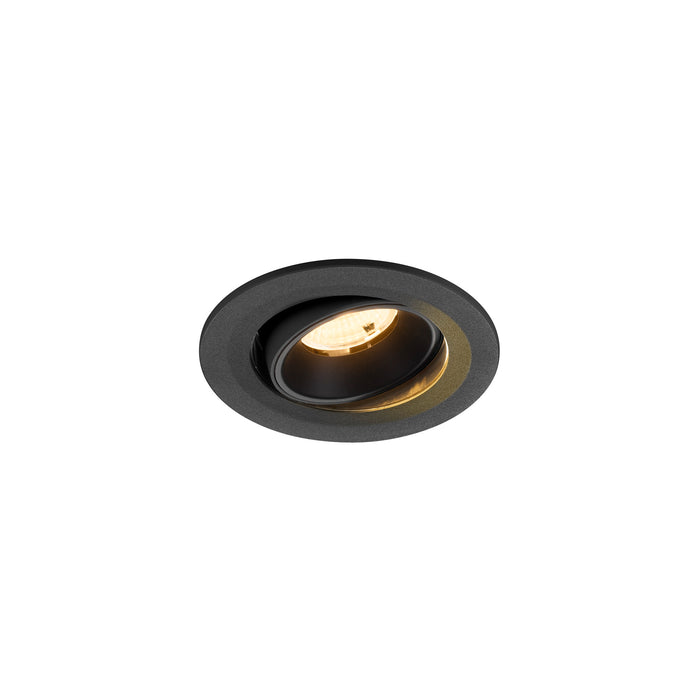 Black recessed ceiling light fixture with adjustable lamp.