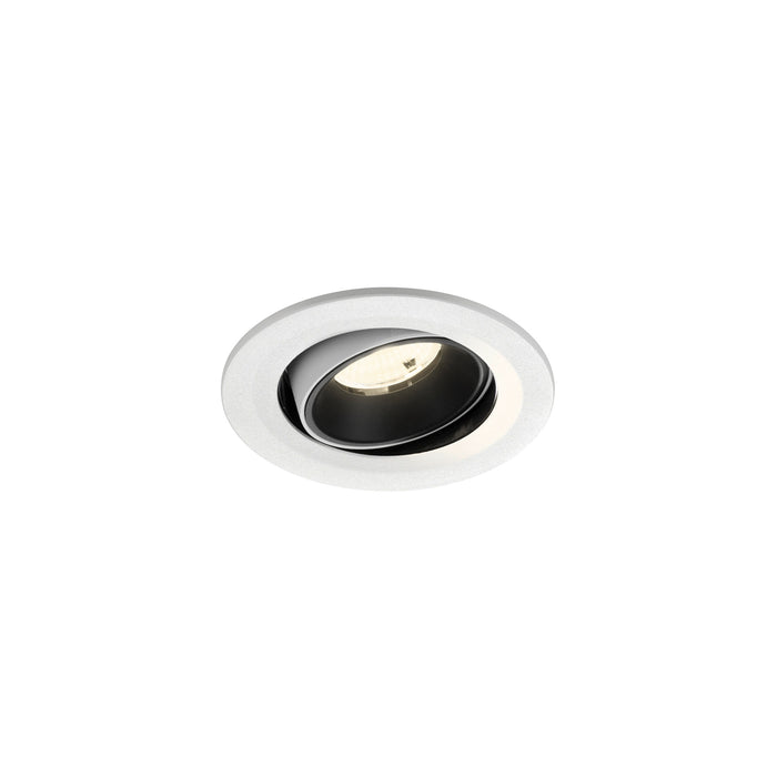 Recessed ceiling light fixture with a black and white finish, made of metal, featuring a sleek design for modern interiors.